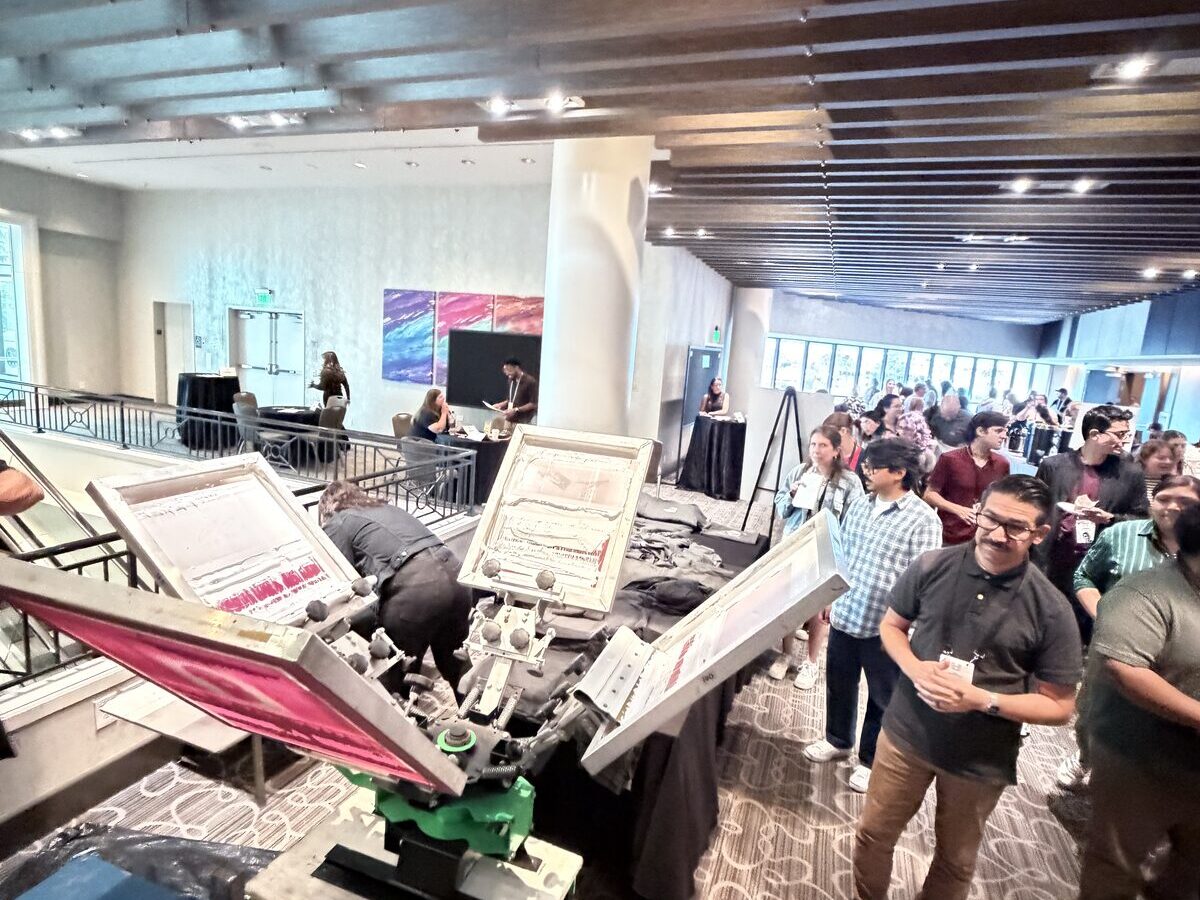 Guests lined up at a live press station at an event
